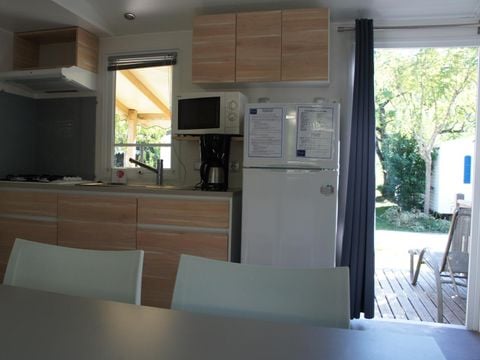 MOBILHOME 7 personnes - Mobil home Premium 32 m² 3 chambres + terrasse 12m² semi-couverte (9m²) + TV + clim 6/7 pers