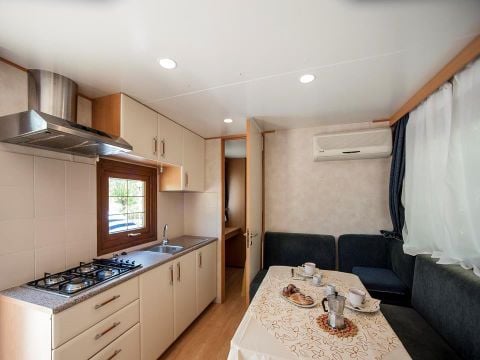 MOBILHOME 4 personnes - (2 personnes incluses - 2 personnes supplémentaires possibles moyennant un supplément, veuillez contacter le camping)