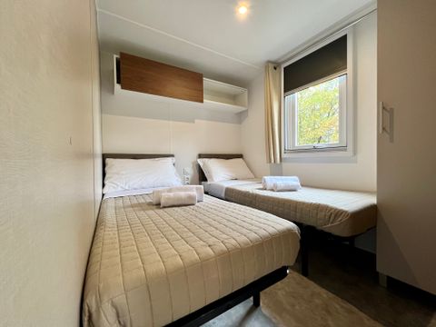 MOBILHOME 2 personnes - (2 personnes incluses - 2 personnes supplémentaires possibles moyennant un supplément, veuillez contacter le camping)