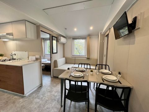 MOBILHOME 2 personnes - (2 personnes incluses - 2 personnes supplémentaires possibles moyennant un supplément, veuillez contacter le camping)