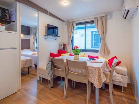 MOBILHOME 6 personnes - Mobil-home | Premium | 3 Ch. | 6 Pers. | Terrasse surélevée | Clim. | TV