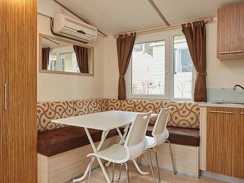 MOBILHOME 4 personnes - Comfort | 2 Ch. | 4 Pers. | Terrasse surélevée | Clim. | TV
