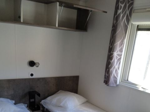MOBILHOME 4 personnes - Confort 27m² - 2 chambres + Terrasse couverte + Clim réversible + TV