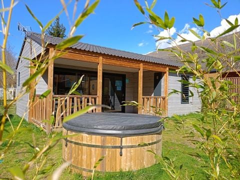 CHALET 4 personnes - SPA Confort 35m² - 2 chambres + Terrasse couverte + Clim réversible + TV