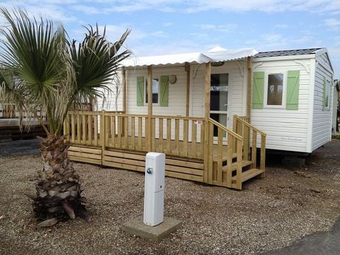 MOBILHOME 2 personnes - 1 chambre bord d'étang, 16m2 catégorie 1