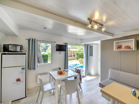 MOBILHOME 4 personnes - Mobil-Home Bois Confort 30m² 2 chambres + terrasse semi-couverte + TV + CLIM 4 pers.