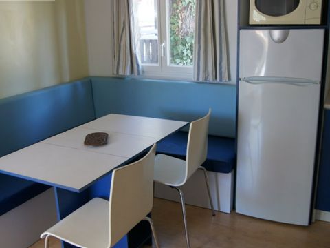 Mobilhome 6 personnes - Agaric ' spécial bébé' - 6 personnes - 2 chambres ' lit parapulie, pousssette canne et réhausseur de chaise'