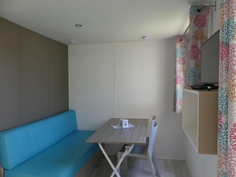 MOBILHOME 2 personnes - Mobil home Confort 18m² - 1 chambre + terrasse couverte + TV 2 pers