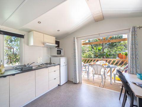 Mobilhome 4 personnes - Mobil-Home ROMARIN Confort 32m² (2 chambres)+ - terrasse couverte 8 m² - TV + Climatisation 1/5 pers