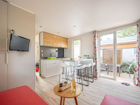 Mobilhome 6 personnes - Mobil-home LAURIER ROSE Premium (3 chambres) 33m2 - terrasse couverte 19m2+ LV + TV + Climatisation 1/7 pers