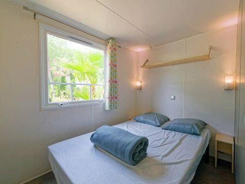 Mobilhome 4 personnes - Mobil-Home OLIVIER Confort 29m² (2 chambres) - terrasse 9 m²+ TV + Climatisation 4 pers