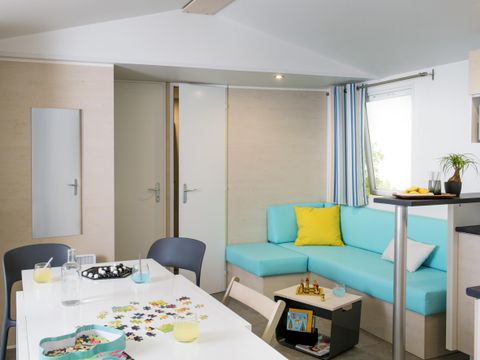 MOBILHOME 7 personnes - Mobil-home confort 34 m2 (3ch-6/7 pers) + terrasse 6/7 pers