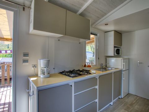 MOBILHOME 4 personnes - Mobil-home Confort 30m² (2 chambres) - terrasse couverte 13m² + TV 4 pers.