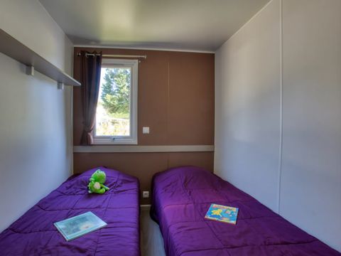 MOBILHOME 4 personnes - Confort 26m² (2 chambres) - terrasse couverte + TV 4 pers.