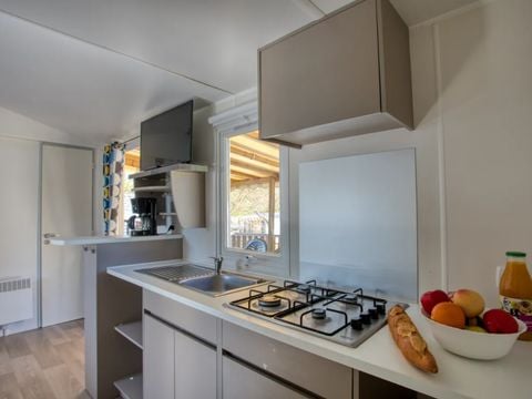 MOBILHOME 4 personnes - Confort 26m² (2 chambres) - terrasse couverte + TV 4 pers.