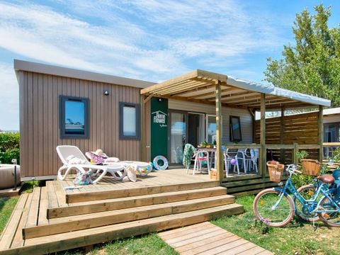 MOBILHOME 4 personnes - NEW// HomeFlower Premium 29m² - 2 chambres + Terrasse semi-couverte + LV + TV + Draps + Clim -