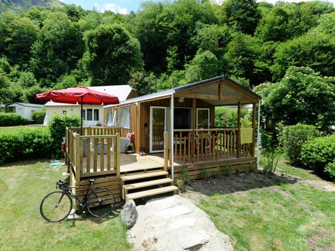 Mobilhome 2 personnes - Confort 23m² - 1 chambre - Terrasse semi-couverte 18m² - BBQ - Salon Extérieur
