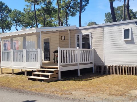MOBILHOME 4 personnes - DIM - SUNELIA PRESTIGE + CLIM 2ch / 4p - 34m² - Terrasse couverte