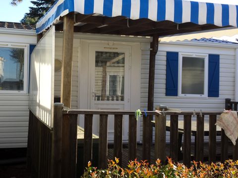 MOBILHOME 4 personnes - CAMPING ACAPULCO/ MH 2 chambres budget Terrasse couverte (modèle +de 15ans) 21-25m² 4 pers