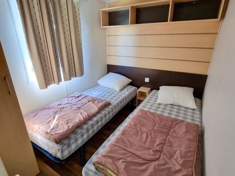 MOBILHOME 4 personnes - Mobil-home Standard 30m² - 2 chambres + Terrasse 10m² + TV + Clim 4 pers