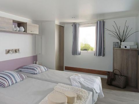 MOBILHOME 4 personnes - Mobilhome HELIOS climatisé PMR (Personne à Mobilité Réduite) 32m² + terrasse semi couverte 15m²