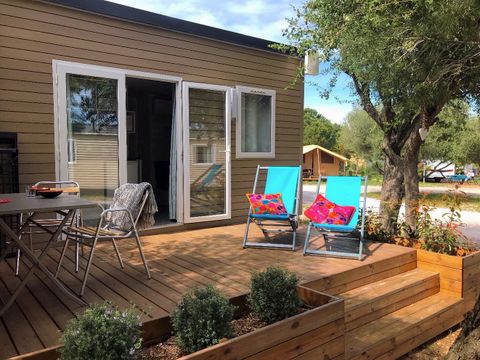Mobilhome 2 personnes - Cahita 17.80m² - 1 chambre - Lit fait à l'arrivée+TV - Climatisation+Terrasse 10m²+wifi