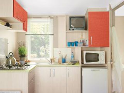 Mobilhome 4 personnes - Essentiel