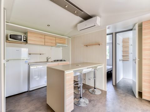 Mobilhome 4 personnes - Premium 28m² - 2 chambres - TV - Climatisé - Lave vaiselle