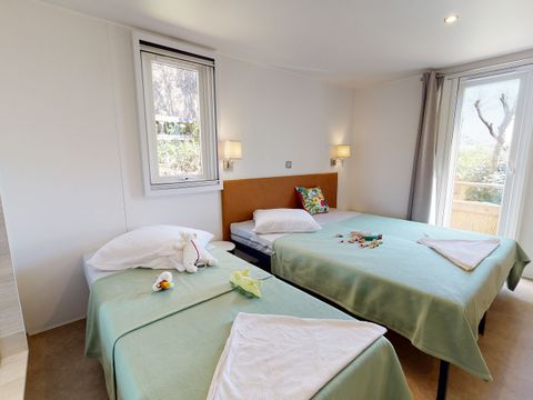 Mobilhome 6 personnes - Lodge - 2 à Vue mer clim. Plancha