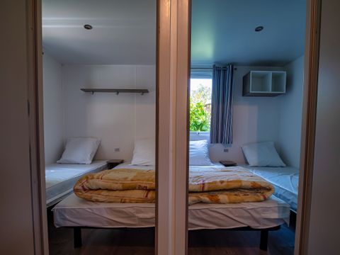 MOBILHOME 6 personnes - Mobil-home Bois Confort 32m² - 3 chambres - Terrasse semi-couverte - TV