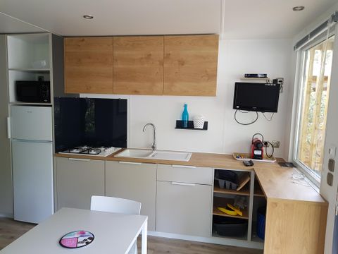 Mobilhome 4 personnes - LIVING 2 ch 28m² - ( 4 adultes max - animaux interdits - non fumeur)