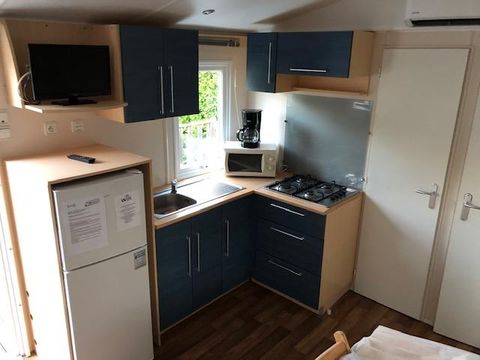 MOBILHOME 7 personnes - NEVADA 3 chambres - 32 m² - avec CLIM.+TV - Terrasse couverte sur 16 m² -