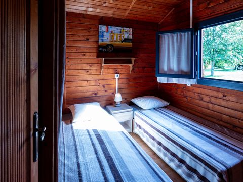 CHALET 4 personnes - 2 chambres climatisé CONFORT PLUS - 35 m2 + terrasse couverte de 14 m2