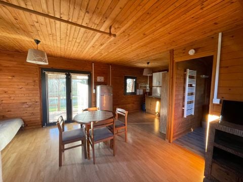 CHALET 4 personnes - CHALET LOFT CONFORT - 1 grande pièce -  clim - TV - BBQ - Ménage* - 35m2 + terrasse couverte de 14m2