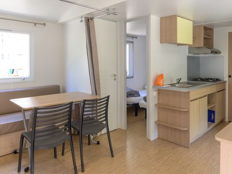 Mobilhome 6 personnes - RIVIERA 29m² - 2 chambres - 1 canapé - Convertible