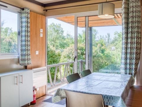 Chalet 5 personnes - Confort 25m² - 2 chambres - Terrasse couverte - Climatisation