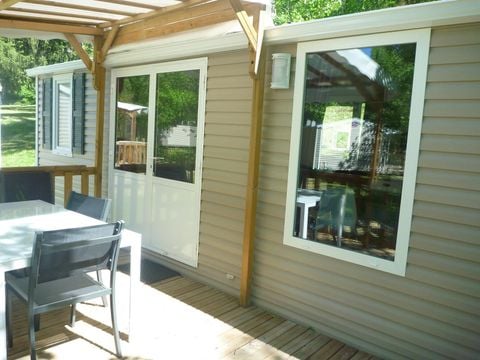 Mobilhome 1/6 personnes - Orchidée Grand Confort 35m² - 2 chambres - Terrasse couverte - CLIM - TV - Lave-vaisselle