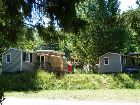 Mobilhome 1/6 personnes - Orchidée Grand Confort 35m² - 2 chambres - Terrasse couverte - CLIM - TV - Lave-vaisselle