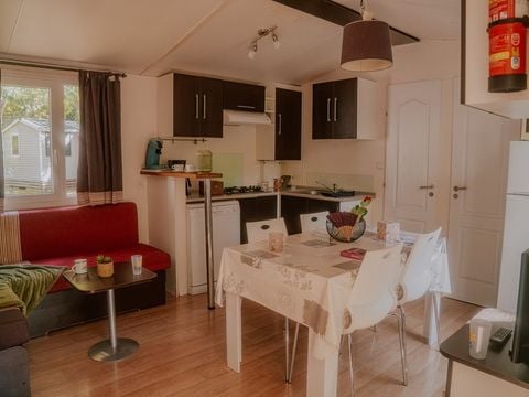 Mobilhome 1/6 personnes - Orchidée Grand Confort 35m² - 2 chambres - Terrasse couverte - CLIM - TV - Lave-vaisselle