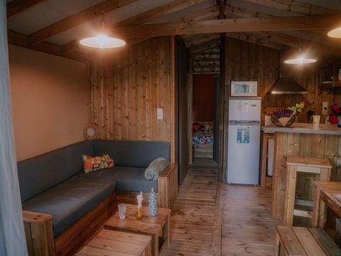 Hébergement 4/7 personnes - Cabane Lodge Premium sur pilotis 32m² - 2 chambres - Avec sanitaires - Terrasse - TV