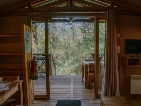 Hébergement 4/7 personnes - Cabane Lodge Premium sur pilotis 32m² - 2 chambres - Avec sanitaires - Terrasse - TV