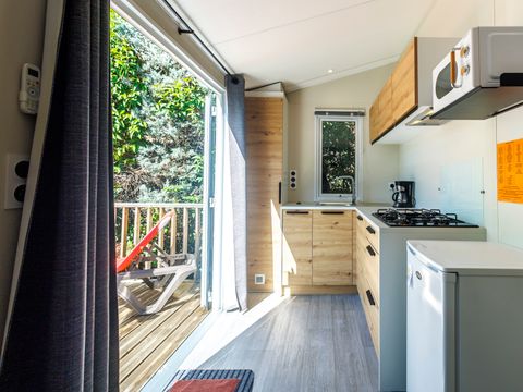 MOBILHOME 2 personnes - Charme 20m² Confort (1ch - 2pers.) + Clim + Terrasse non-couverte