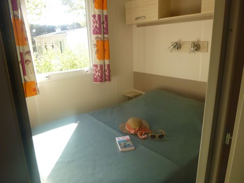 MOBILHOME 4 personnes - 24m² Standard (2ch - 4pers.) + Paillotte extérieure