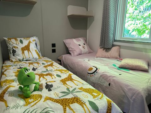 Mobilhome 4 personnes - Confort Riviera 29m² - 2 chambres - Terrasse couverte 18m²