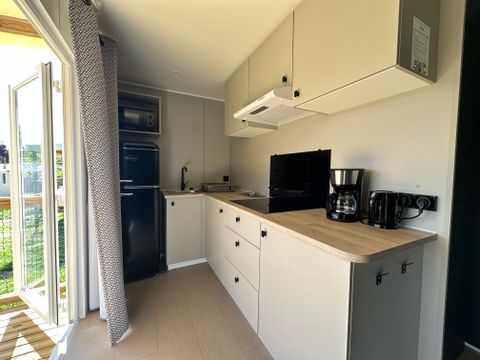Mobilhome 4 personnes - Confort Riviera 29m² - 2 chambres - Terrasse couverte 18m²