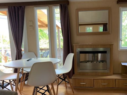 MOBILHOME 4 personnes - Mobil-Home COTTAGE : 1 Suite + 1 Chambre - Cheminée - TV - Grand Réfrigérateur - 4 pers