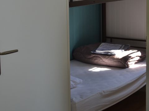 Hébergement 4 personnes - Chalet sur pilotis - 2 chambres - Bord de rivière