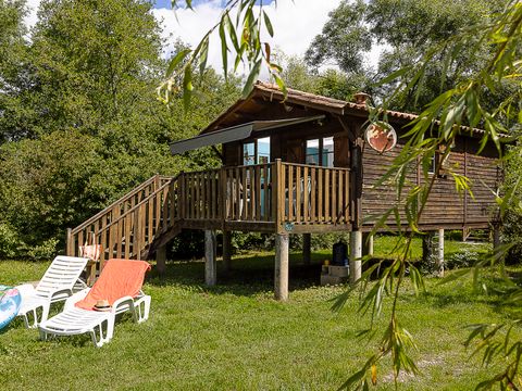 Hébergement 4 personnes - Chalet sur pilotis - 2 chambres - Bord de rivière