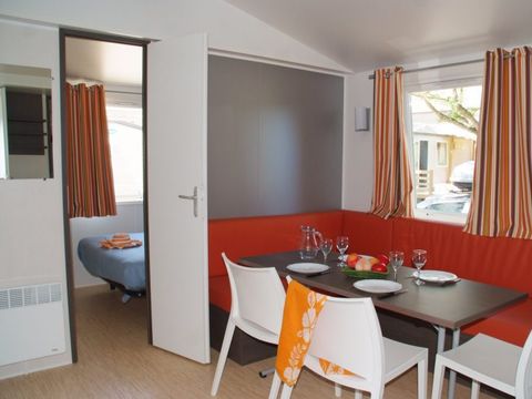 MOBILHOME 4 personnes - Mobil-home Confort 27m² 2 chambres + terrasse couverte - sans tv-sans clim 4 pers