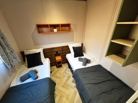 Chalet 7 personnes - Prestige 60 m² - 3 chambres - Dont terrasse couverte - Clim - TV - Lave-vaisselle - Plancha
